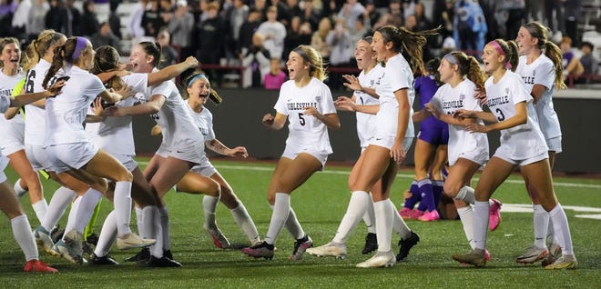 Noblesville Millers celebrate defeating the Bloomington South Panthers on Saturday, Oct. 28, 2023, during the IHSAA girls soccer Class 3A state championship at Michael Carroll Track & Soccer Stadium in Indianapolis. The Noblesville Millers defeated the Bloomington South Panthers, 3-1.