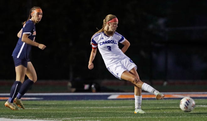 Carroll Chargers Faithlyn Bennett (3) passes the ball during the IHSAA girls soccer regional game against the Harrison Raiders, Thursday, Oct. 12, 2023, at Harrison High School in West Lafayette, Ind. Carroll won 1-0.