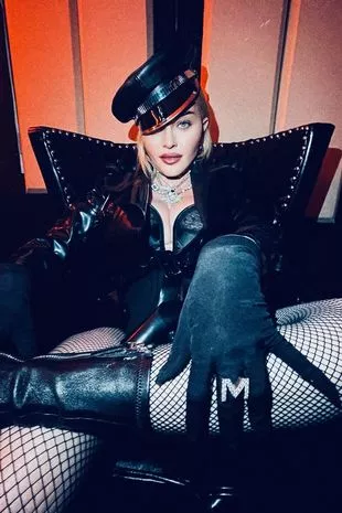 1_Madonna-dons-fishnet-tights-and-leather-ensemble-in-x-rated-photos-amid-unrecognisable-face.jpg