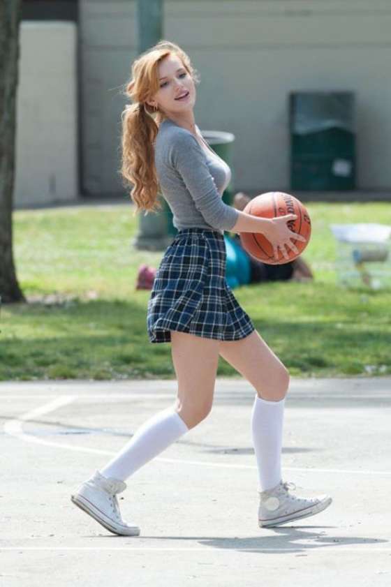 Bella-Thorne-in-Mini-Skirt-Playing-Basketball-on-Mostly-Ghostly-2-set--09.jpg