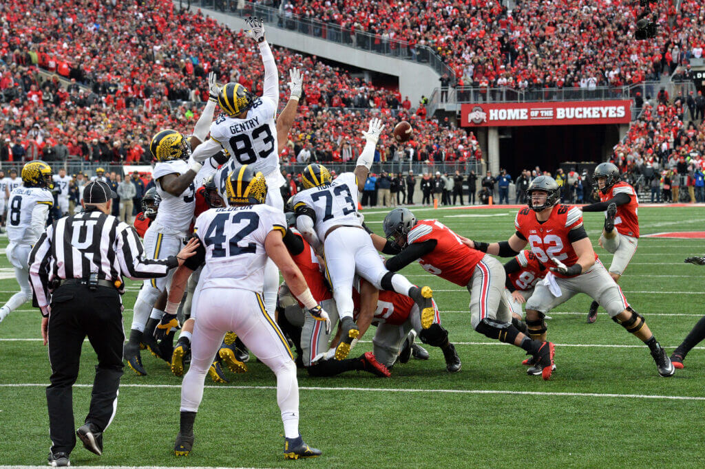 COLUMBUS, OH - NOVEMBER 26:   Tyler Durbin #92 of the Ohio State Buckeyes kicks an extra point during overtime of the game against the Michigan Wolverines at Ohio Stadium on November 26, 2016 in Columbus, Ohio.  (Photo by Jamie Sabau/Getty Images)