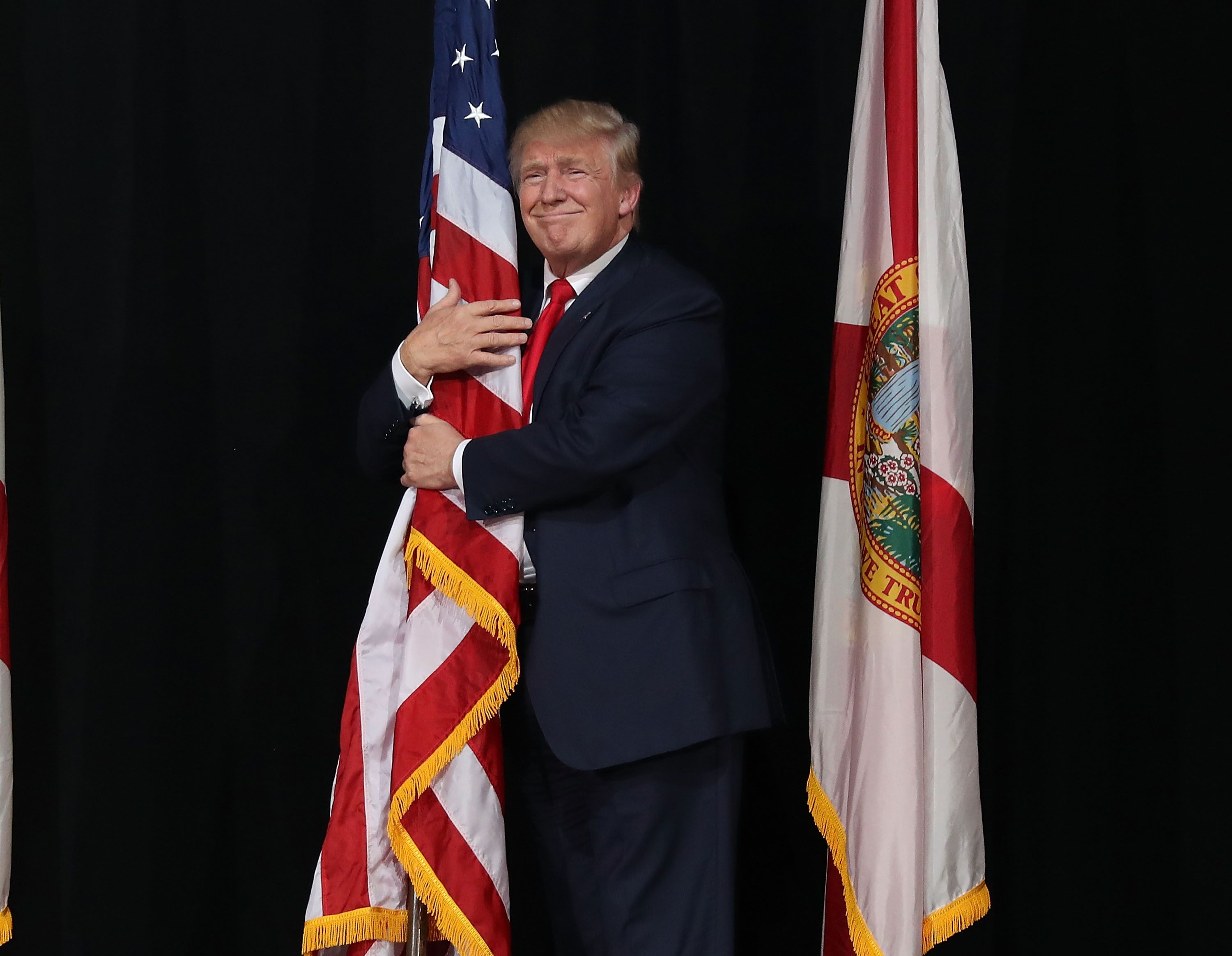 republican-presidential-candidate-donald-trump-hugs-the-news-photo-617806568-1560614003.jpg
